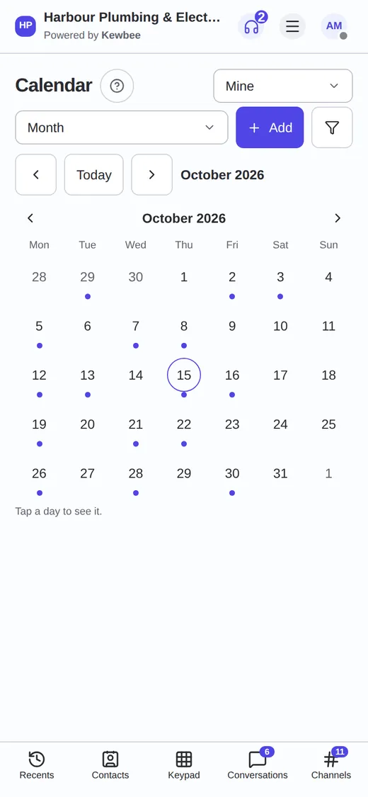 The shared team calendar on a phone, with a month grid and the chosen day below.
